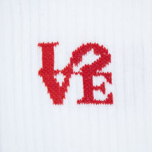 Load image into Gallery viewer, Red 'LOVE' text on a white background
